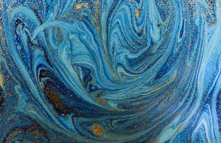 Marbled blue and golden abstract background. Liquid marble patternの写真素材