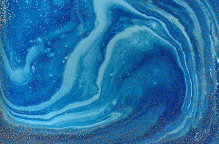 Marbled blue and golden abstract background. Liquid marble patternの写真素材