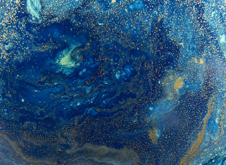 Marbled blue and golden abstract background. Liquid marble pattern.の写真素材