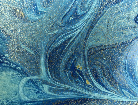 Marbled blue and golden abstract background. Liquid marble patternの写真素材