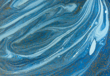 Marbled blue and golden abstract background. Liquid marble patternの写真素材