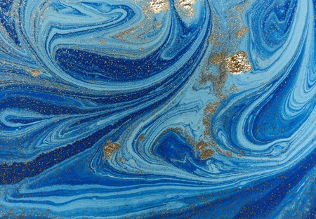 Marbled blue and golden abstract background. Liquid marble patternの写真素材