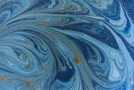 Marbled blue and golden abstract background. Liquid marble patternの写真素材