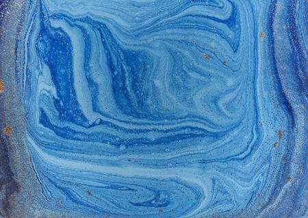 Marbled blue and golden abstract background. Liquid marble patternの写真素材