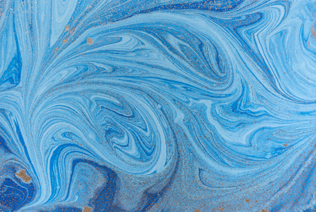 Marbled blue and golden abstract background. Liquid marble patternの写真素材