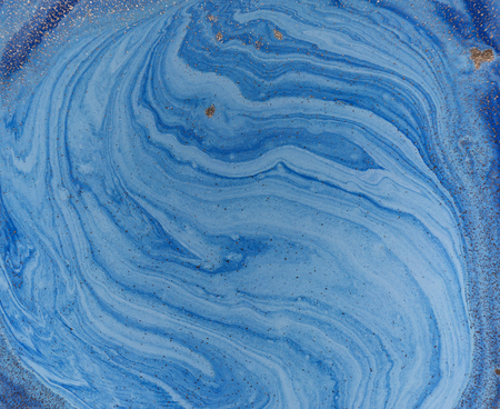 Marbled blue and golden abstract background. Liquid marble patternの写真素材