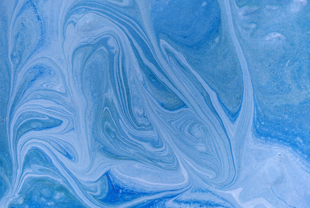 Marbled blue and golden abstract background. Liquid marble patternの写真素材