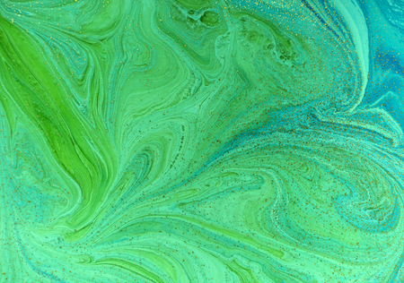 Marbled green and golden abstract background. Liquid marble patternの写真素材