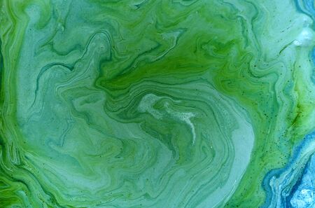 Marbled blue, green and golden abstract background. Liquid marble patternの写真素材