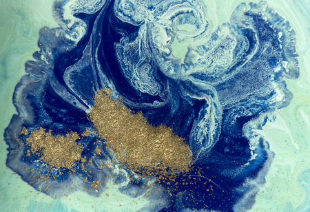 Marbled blue and golden abstract background. Liquid marble patternの写真素材