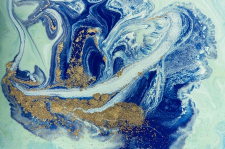 Marbled blue and golden abstract background. Liquid marble pattern.の写真素材