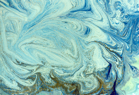 Marbled blue and golden abstract background. Liquid marble patternの写真素材