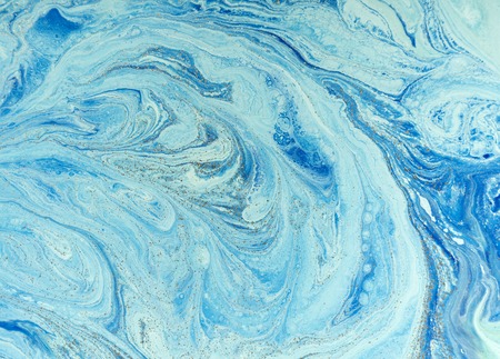Marbled blue and golden abstract background. Liquid marble patternの写真素材