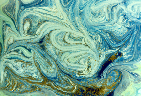 Marbled blue and golden abstract background. Liquid marble patternの写真素材
