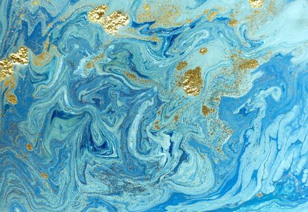 Marbled blue and golden abstract background. Liquid marble pattern.の写真素材
