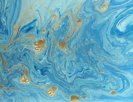 Marbled blue and golden abstract background. Liquid marble pattern.の写真素材