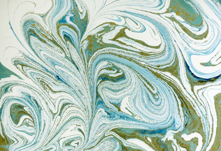 Marbled blue and golden abstract background. Liquid marble pattern.の写真素材