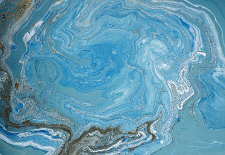 Marbled blue and golden abstract background. Liquid marble patternの写真素材