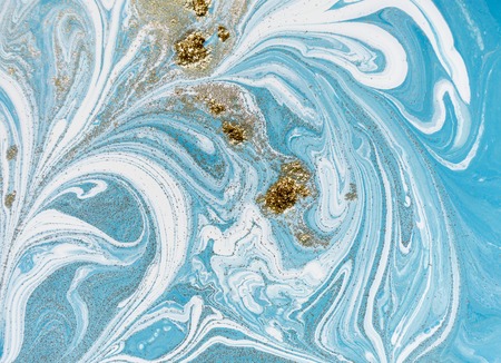 Marbled blue and golden abstract background. Liquid marble patternの写真素材