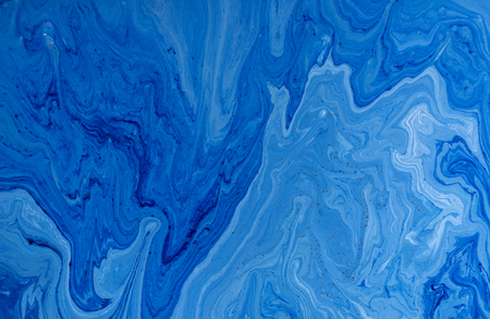 Marbled blue and golden abstract background. Liquid marble patternの写真素材
