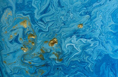 Marbled blue and golden abstract background. Liquid marble pattern.の写真素材