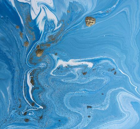 Marbled blue and golden abstract background. Liquid marble pattern.の写真素材