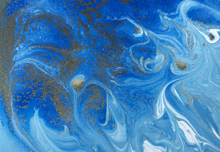 Marbled blue and golden abstract background. Liquid marble pattern.の写真素材