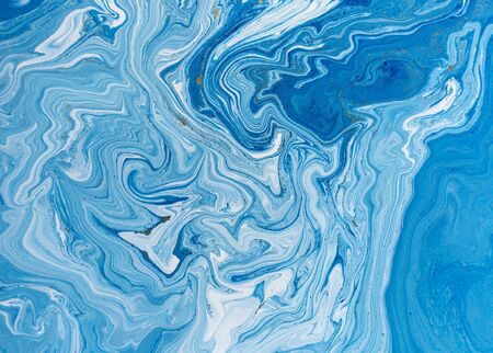Marbled blue and golden abstract background. Liquid marble pattern.の写真素材