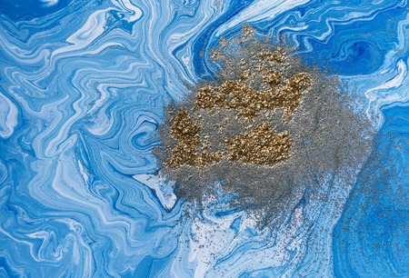 Marbled blue and golden abstract background. Liquid marble pattern.の写真素材