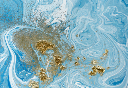 Marbled blue and golden abstract background. Liquid marble pattern.の写真素材