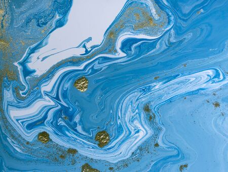 Marbled blue and golden abstract background. Liquid marble pattern.の写真素材