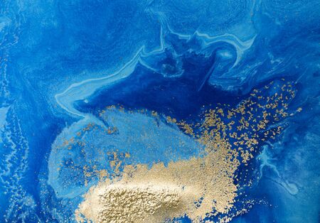 Marbled blue and golden abstract background. Liquid marble pattern.の写真素材