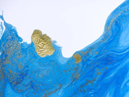 Marbled blue and golden abstract background. Liquid marble pattern.の写真素材