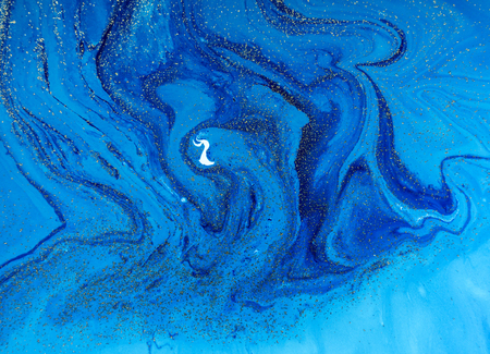 Marbled blue and golden abstract background. Liquid marble pattern.の写真素材