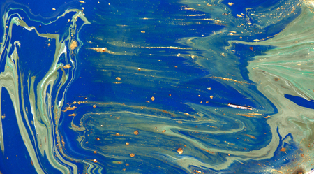 Marbled abstract background. Liquid marble pattern. Colorful marble backdrop. Golden glitter texture.の写真素材