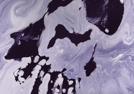 Marbled purple abstract background with golden sequins. Liquid marble ink pattern.の写真素材