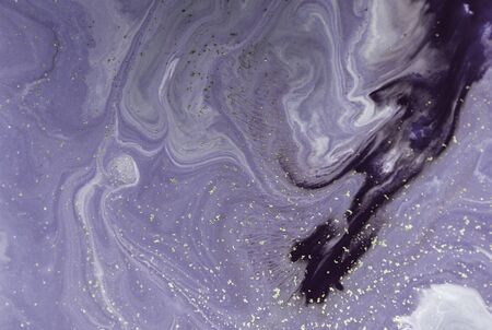 Marbled pale purple abstract background with golden sequins. Liquid marble ink pattern.