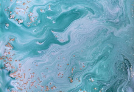 Marble abstract acrylic background. Blue marbling artwork texture. Golden glitter.の写真素材