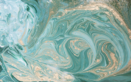 Marble abstract acrylic background. Nature green marbling artwork texture. Golden glitter.の写真素材