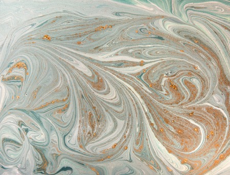Marble abstract acrylic background. Nature green marbling artwork texture. Golden glitter.の写真素材