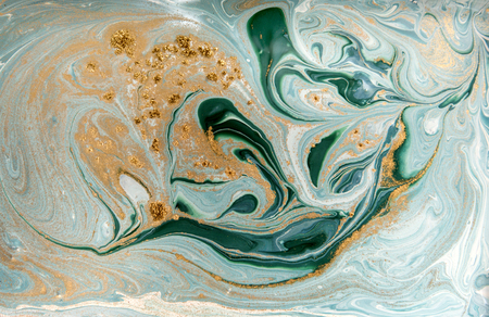 Marble abstract acrylic background. Nature blue marbling artwork texture. Golden glitter.の写真素材