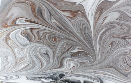 Marble abstract acrylic background. Nature black marbling artwork texture. Golden glitter.の写真素材