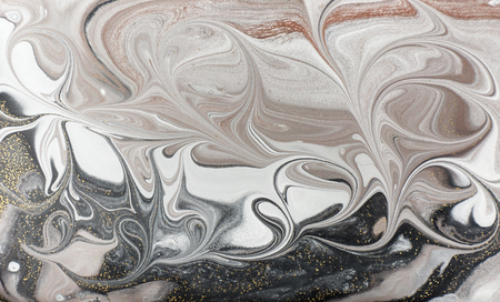 Marble abstract acrylic background. Nature black marbling artwork texture. Golden glitter.の写真素材