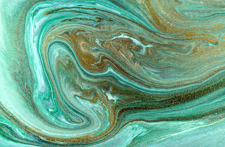 Marble abstract acrylic background. Nature green marbling artwork texture. Golden glitter.の写真素材