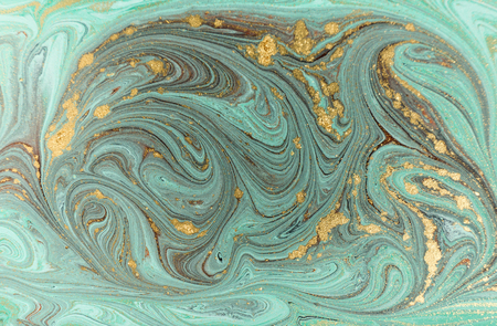 Marble abstract acrylic background. Nature green marbling artwork texture. Golden glitter.の写真素材