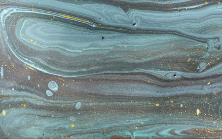 Marble abstract acrylic background. Nature blue marbling artwork texture. Golden glitter.の写真素材