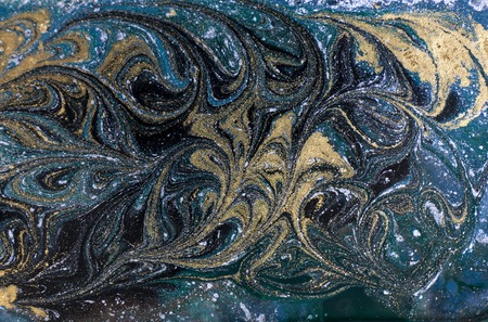 Marble abstract acrylic background. Nature blue and green marbling artwork texture. Golden glitter.の写真素材
