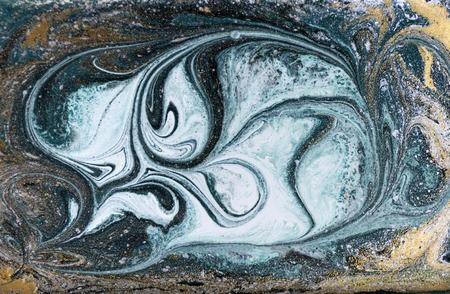 Marble abstract acrylic background. Nature blue and green marbling artwork texture. Golden glitter.の写真素材