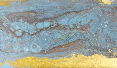 Marble abstract acrylic background. Nature blue marbling artwork texture. Gold glitter.の写真素材
