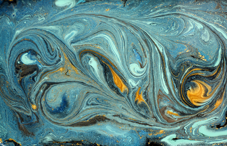 Marble abstract acrylic background. Blue marbling artwork texture. Agate ripple pattern. Gold powder.の写真素材